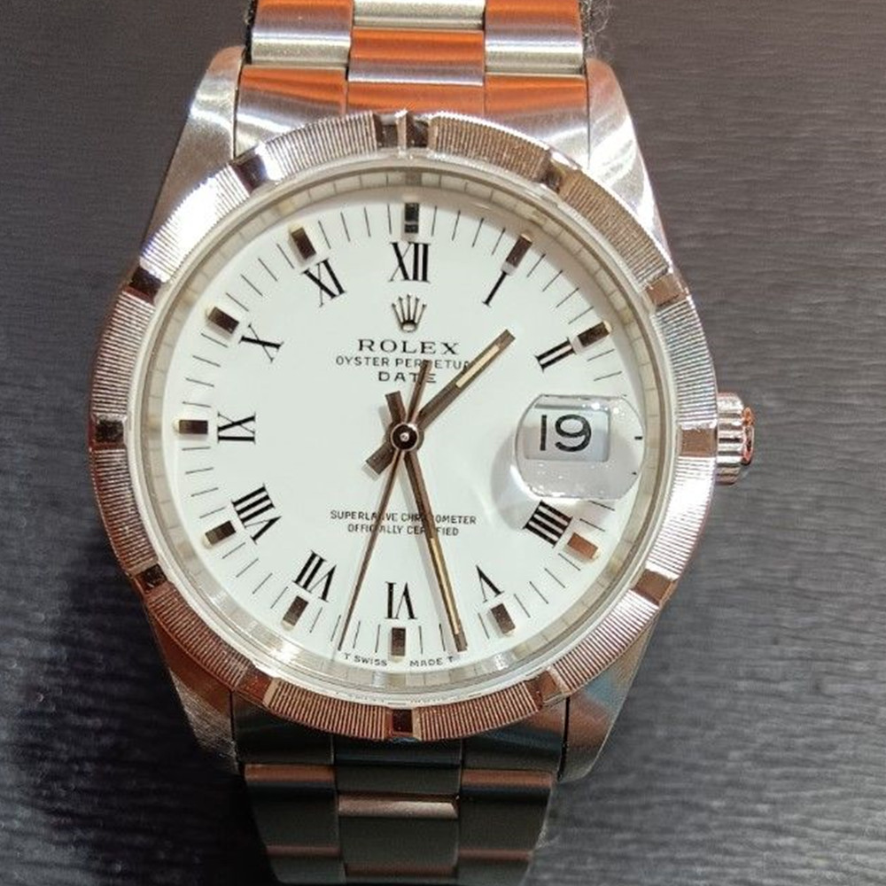 Rolex Oyster Perpetual Date 15210 34 MM - WatchesReplica.is