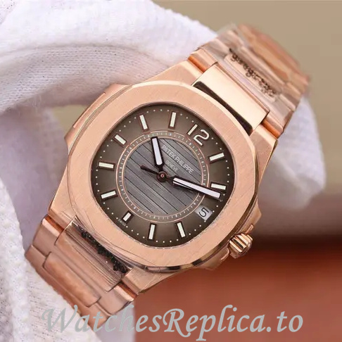 Patek Philippe Replica Nautilus 7011 Rose Gold strap 32MM - WatchesReplica.is
