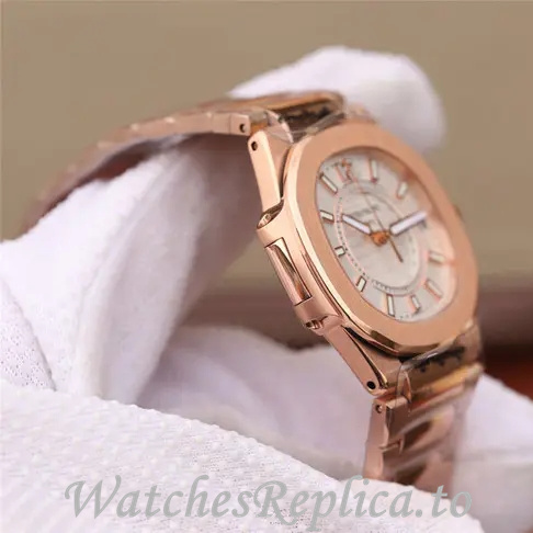 Patek Philippe Replica Nautilus 7011 Rose Gold strap 32MM - WatchesReplica.is