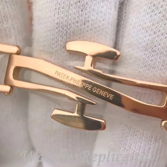 Patek Philippe Replica Nautilus 7011 Rose Gold strap 32MM - WatchesReplica.is