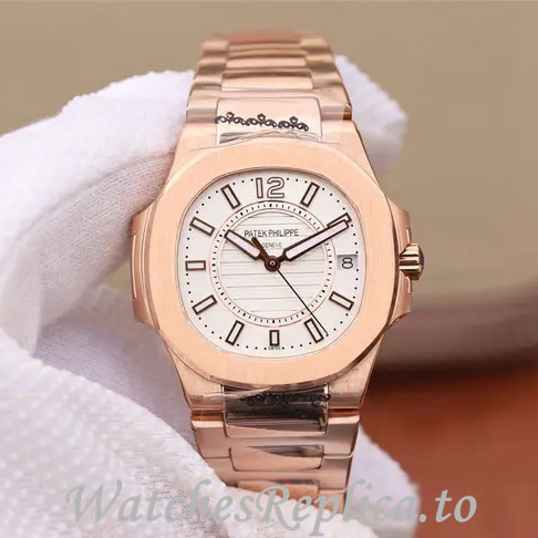 Patek Philippe Replica Nautilus 7011 Rose Gold strap 32MM - WatchesReplica.is