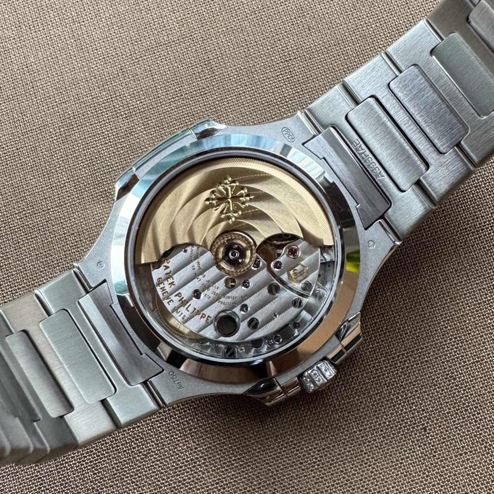 Patek Philippe Nautilus 7118-1453G-001 Diamond Dial 35.2mm - WatchesReplica.is