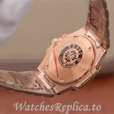 Patek Philippe Replica Nautilus 7011 Rose Gold strap 32MM - WatchesReplica.is