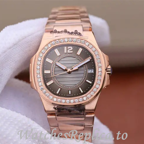 Patek Philippe Replica Nautilus 7011 Rose Gold strap 32MM - WatchesReplica.is