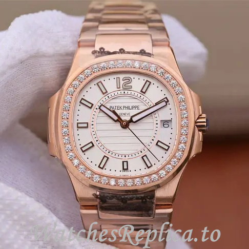Patek Philippe Replica Nautilus 7011 Rose Gold strap 32MM - WatchesReplica.is