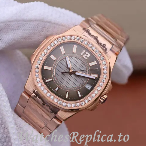 Patek Philippe Replica Nautilus 7011 Rose Gold strap 32MM - WatchesReplica.is