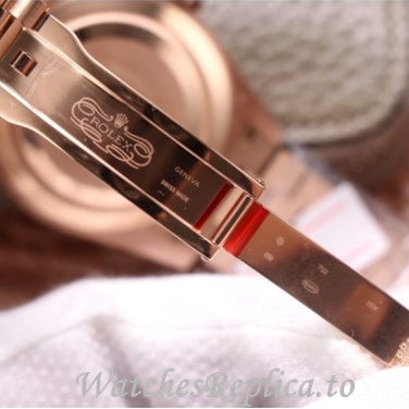 Swiss Rolex Day Date Replica 228345 Rose Gold strap 40MM - WatchesReplica.is