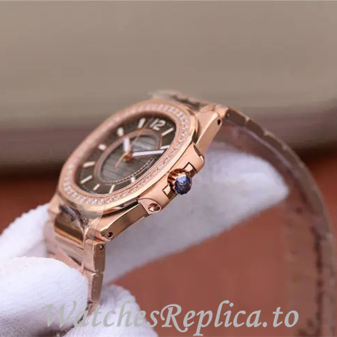 Patek Philippe Replica Nautilus 7011 Rose Gold strap 32MM - WatchesReplica.is