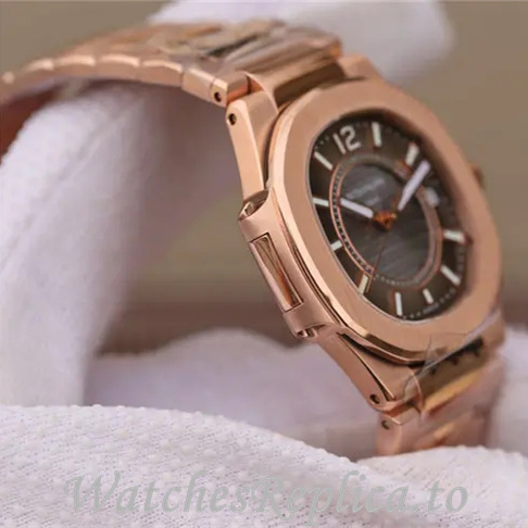 Patek Philippe Replica Nautilus 7011 Rose Gold strap 32MM - WatchesReplica.is