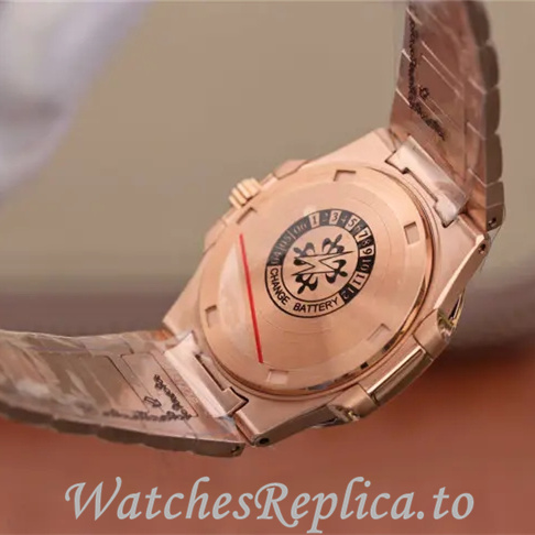 Patek Philippe Replica Nautilus 7011 Rose Gold strap 32MM - WatchesReplica.is