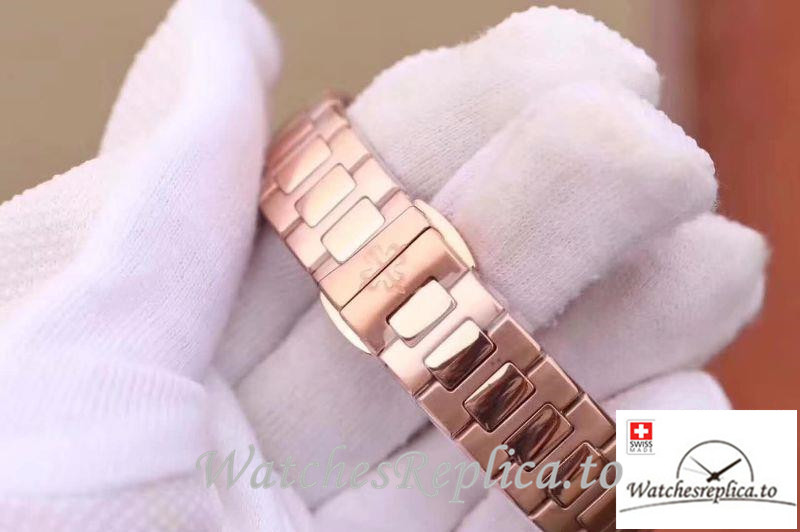 Swiss Patek Philippe Nautilus Ladies Replica 7010/1R-011 Rose Gold Strap 32MM - WatchesReplica.is