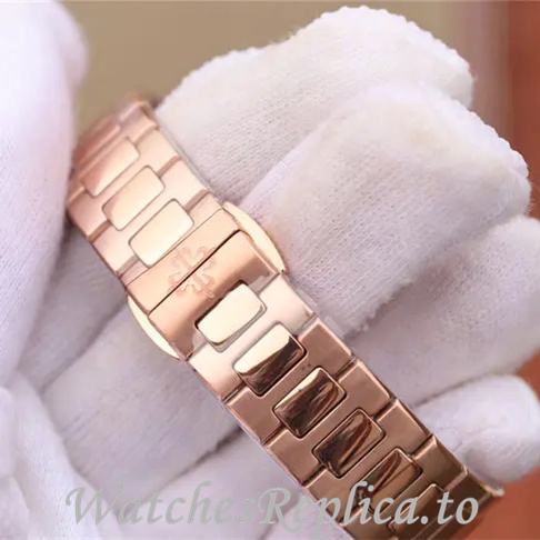Patek Philippe Replica Nautilus 7011 Rose Gold strap 32MM - WatchesReplica.is