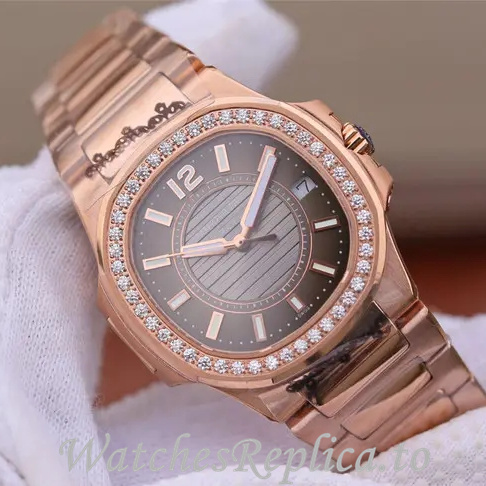 Patek Philippe Replica Nautilus 7011 Rose Gold strap 32MM - WatchesReplica.is