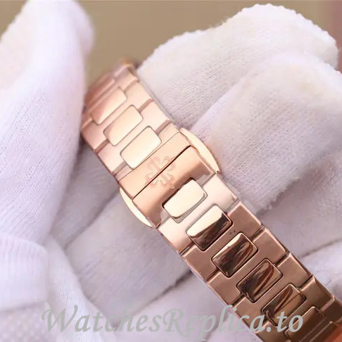 Patek Philippe Replica Nautilus 7011 Rose Gold strap 32MM - WatchesReplica.is