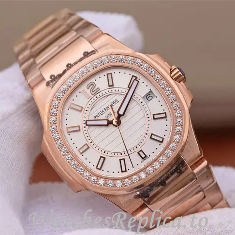 Patek Philippe Replica Nautilus 7011 Rose Gold strap 32MM - WatchesReplica.is