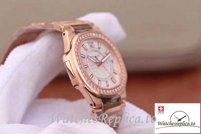 Swiss Patek Philippe Nautilus Ladies Replica 7010/1R-011 Rose Gold Strap 32MM - WatchesReplica.is