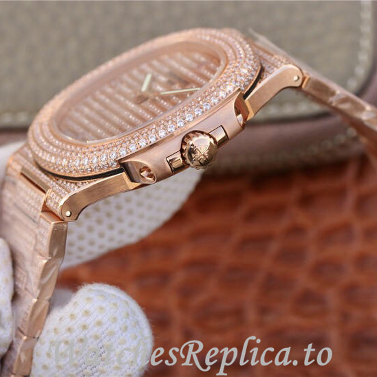 Patek Philippe Replica Nautilus Rose Gold strap 40MM - WatchesReplica.is