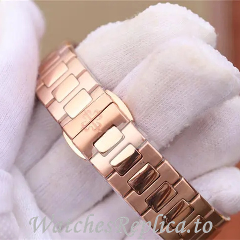 Patek Philippe Replica Nautilus 7011 Rose Gold strap 32MM - WatchesReplica.is
