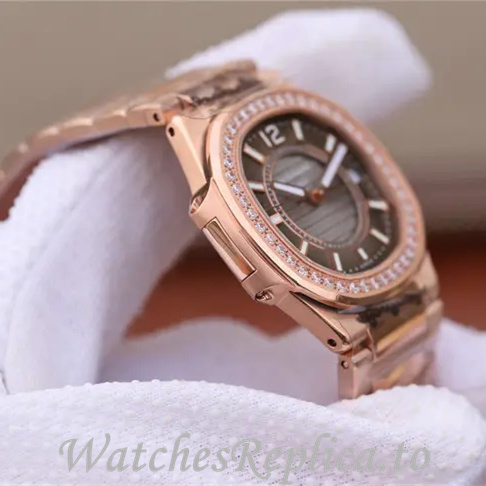 Patek Philippe Replica Nautilus 7011 Rose Gold strap 32MM - WatchesReplica.is