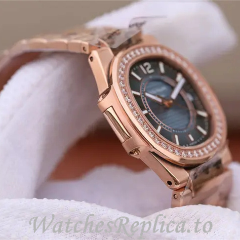 Patek Philippe Replica Nautilus 7011 Rose Gold strap 32MM - WatchesReplica.is