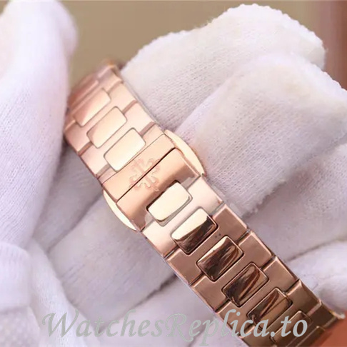Patek Philippe Replica Nautilus 7011 Rose Gold strap 32MM - WatchesReplica.is