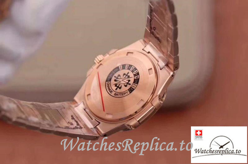 Swiss Patek Philippe Nautilus Ladies Replica 7010/1R-011 Rose Gold Strap 32MM - WatchesReplica.is