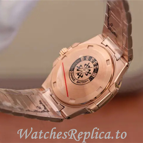 Patek Philippe Replica Nautilus 7011 Rose Gold strap 32MM - WatchesReplica.is